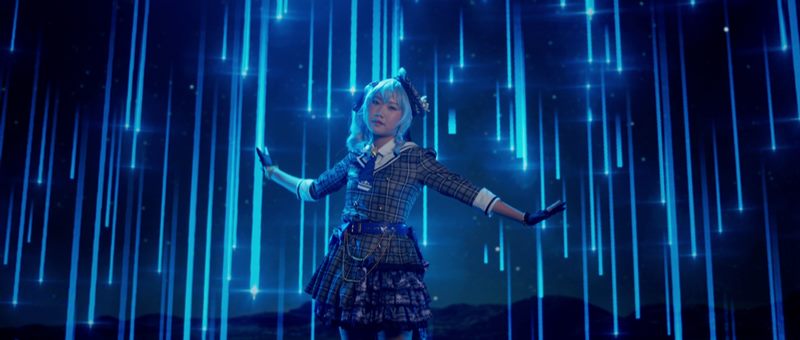 Still from Stellar Stellar fanmade MV with a performer against blue light beams
